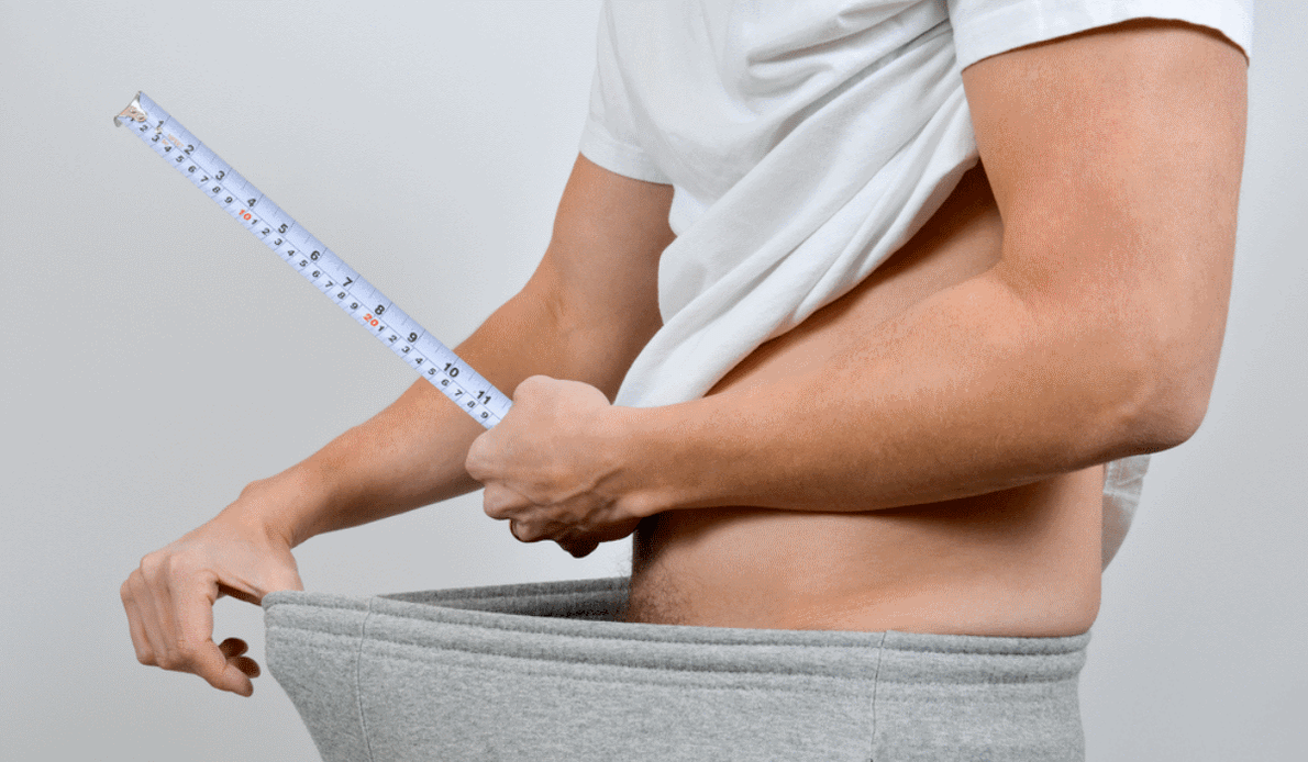 medición do pene cun centímetro